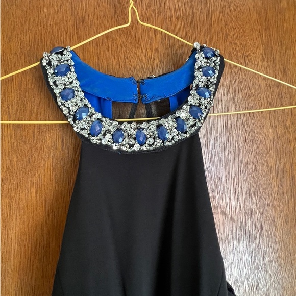 Beautiful black floor length gown with jeweled neckline and cut out sides - Picture 3 of 12